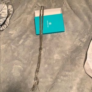 Long silver knotted necklace